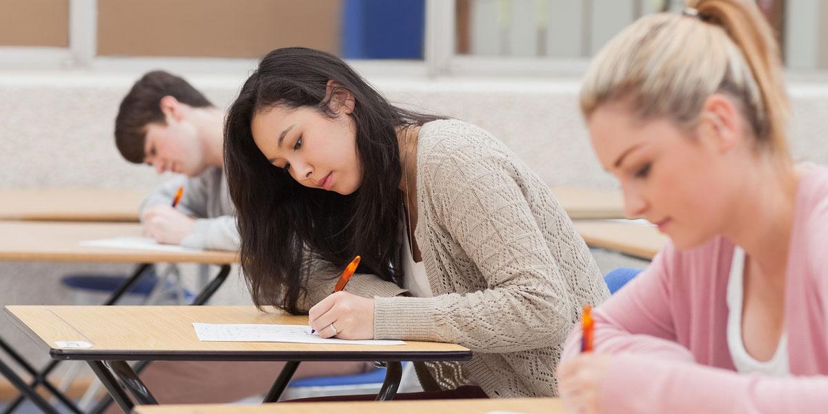 Students taking a test in a classroom.